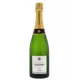 Bottle of Champagne LAËTITIA TORCHET Brut Tradition being served.