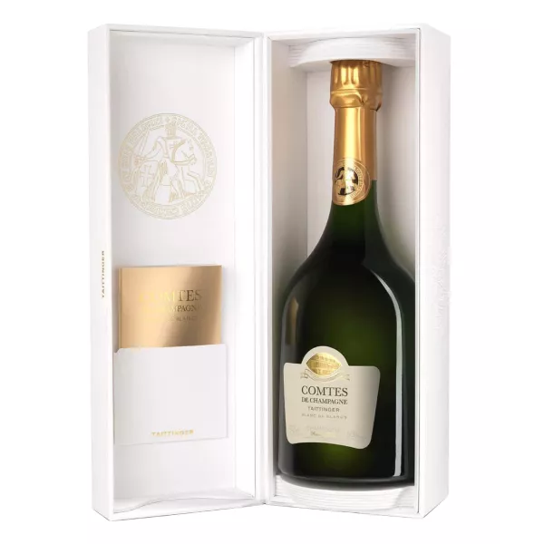 Bottle of Champagne Taittinger Comtes de Champagne 2013, front view, white label and gold cap