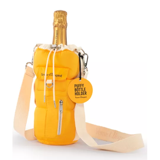 Veuve Clicquot Champagne bottle in a yellow fleece bottle holder with crossed strap
