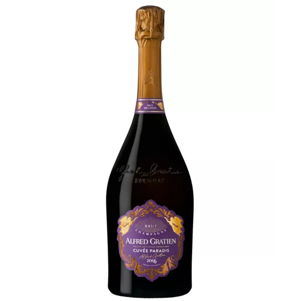 Champagne Alfred Gratien Cuvée Paradis 2016 poured into a glass revealing its golden colour